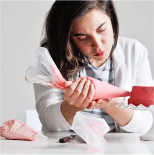 Creator smiling outdoors