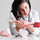 Creator smiling outdoors